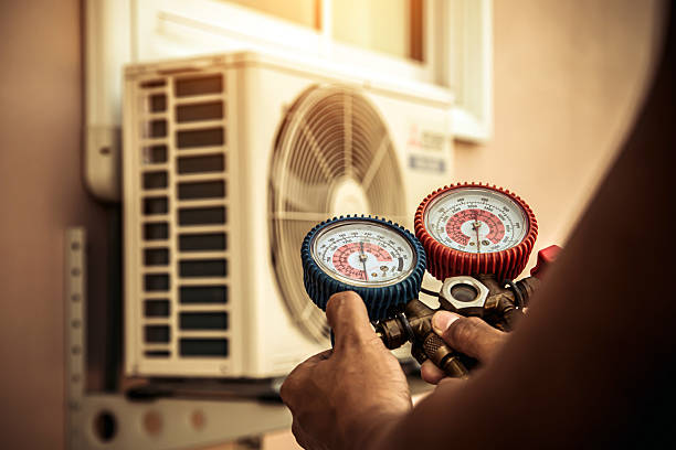 Professional Heat Pump Repair technician working in Gardner, MA